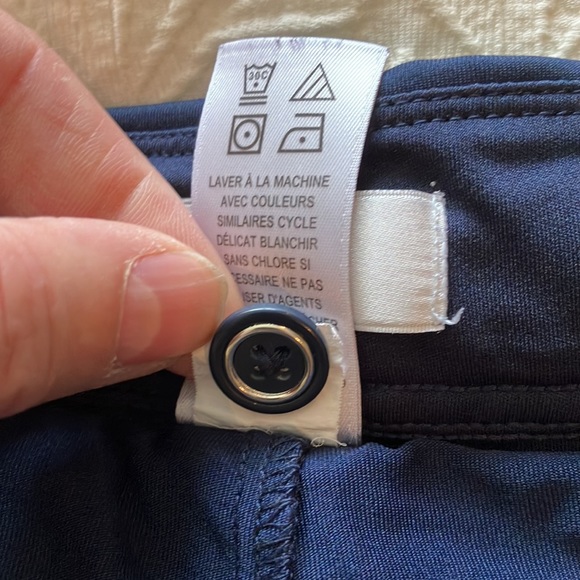 Great Greg Norman navy skort with navy and silver braid around waistband. - Picture 10 of 15